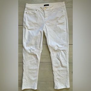 White House Black Market white slim crop, distressed at knees